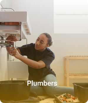Skilled Plumbers Working