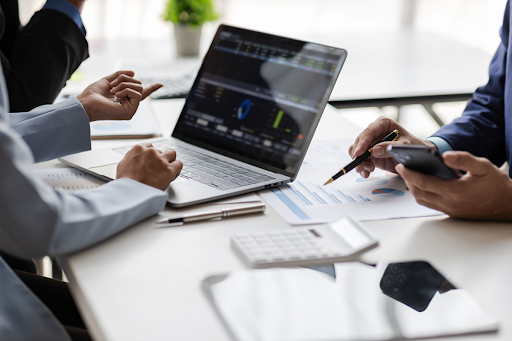 A marketing strategy meeting between a business owner and their marketing consultant