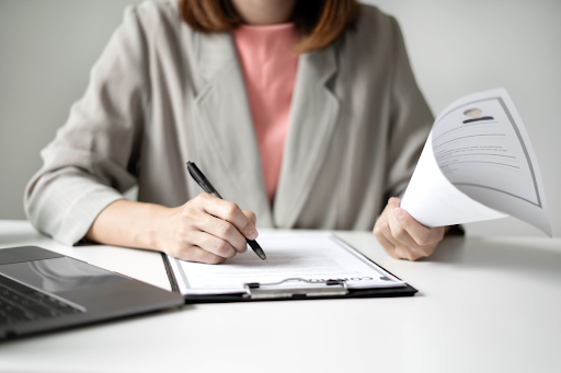 HR woman reading through applications